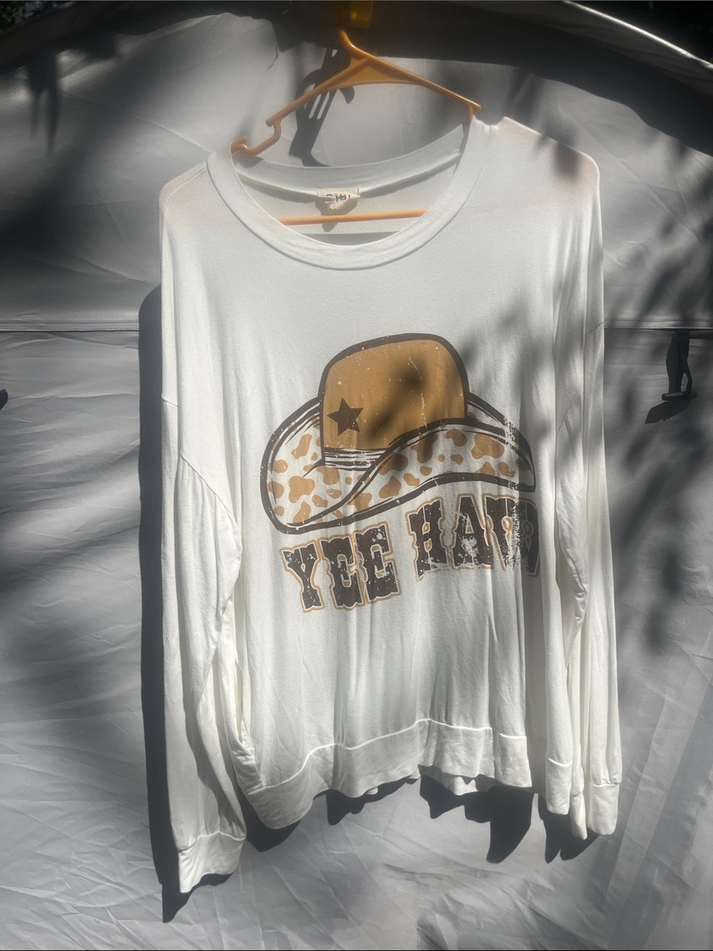 BiBi White Long-Sleeve Tee with Tan Cowboy Hat Graphic and 'YEE HAW' Text